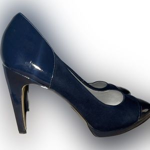 Gently worn navy blue pumps